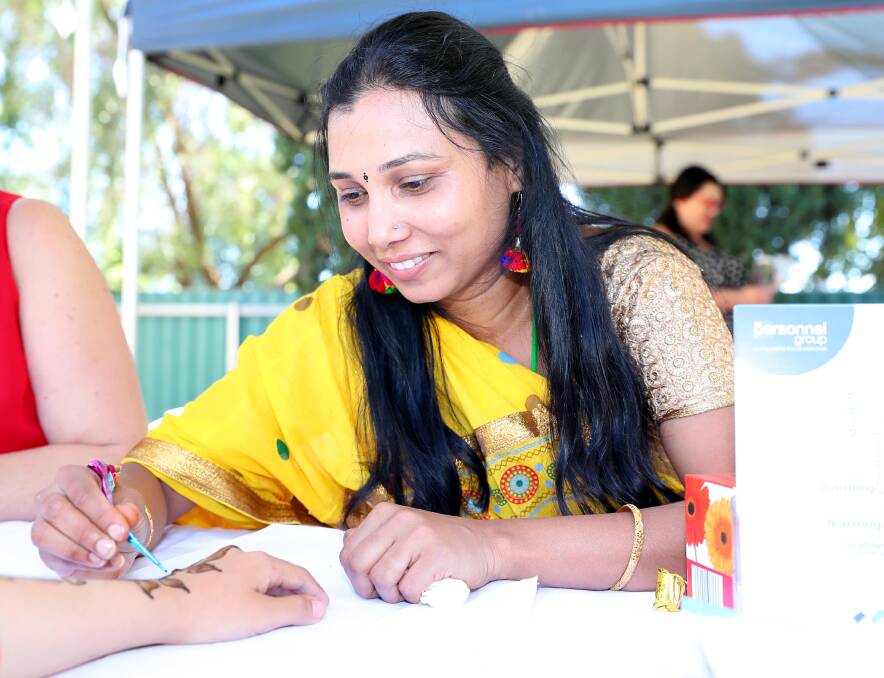 SIDE HUSTLE: Local disability support worker Shantala Beelagi works on the side as a henna artist and uses muliticultural events as opportunities to offer her creative services. 