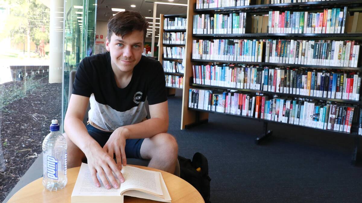 OPENING DOORS: Library visitor Dylan Trevaskis says the proposal to abolish overdue fees for resources will likely encourage more people in the community to borrow "because they don't have that overhead fee affecting them". Picture: Les Smith