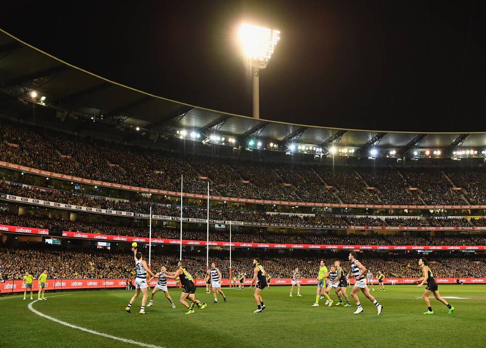 There is a renewed push from the usual suspects to switch the AFL grand final to a night game at the MCG despite a thumbs down from footy fans. Photo: Quinn Rooney/Getty Images