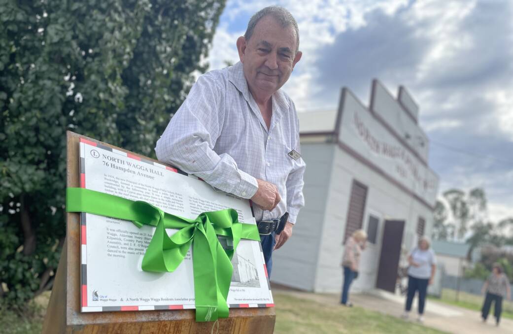 PROUD: North Wagga Residents' Association member Peter Morris alongside one of the brand new heritage signs installed across the suburb. Picture: Monty Jacka