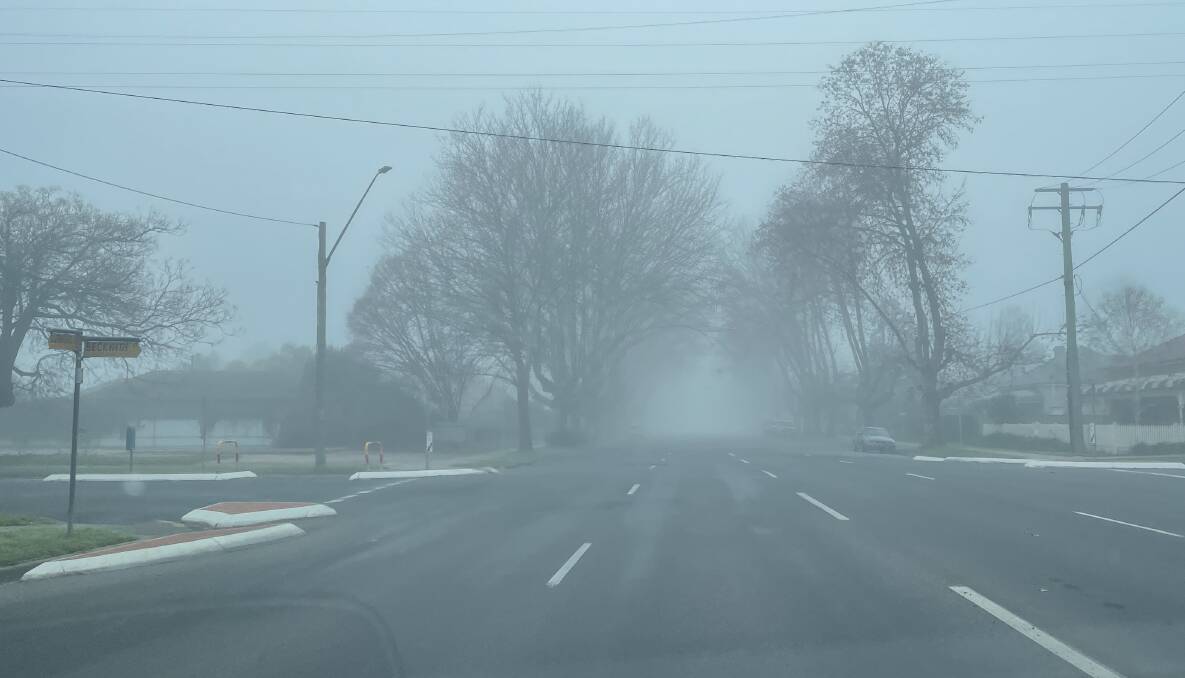 CHILLY: Gurwood Street was blanketed in fog on Sunday morning, as temperatures dropped as low as -0.9 degrees celsius. Picture: Monty Jacka