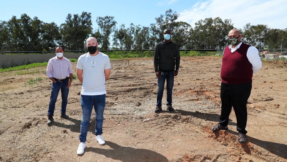 FIELD OF DREAMS: Naveed Aslam, Mat Snowden, Suraj Salem and Quazi Mamun are hoping to build a mosque and community centre on Jones Street. Picture: Emma Hillier