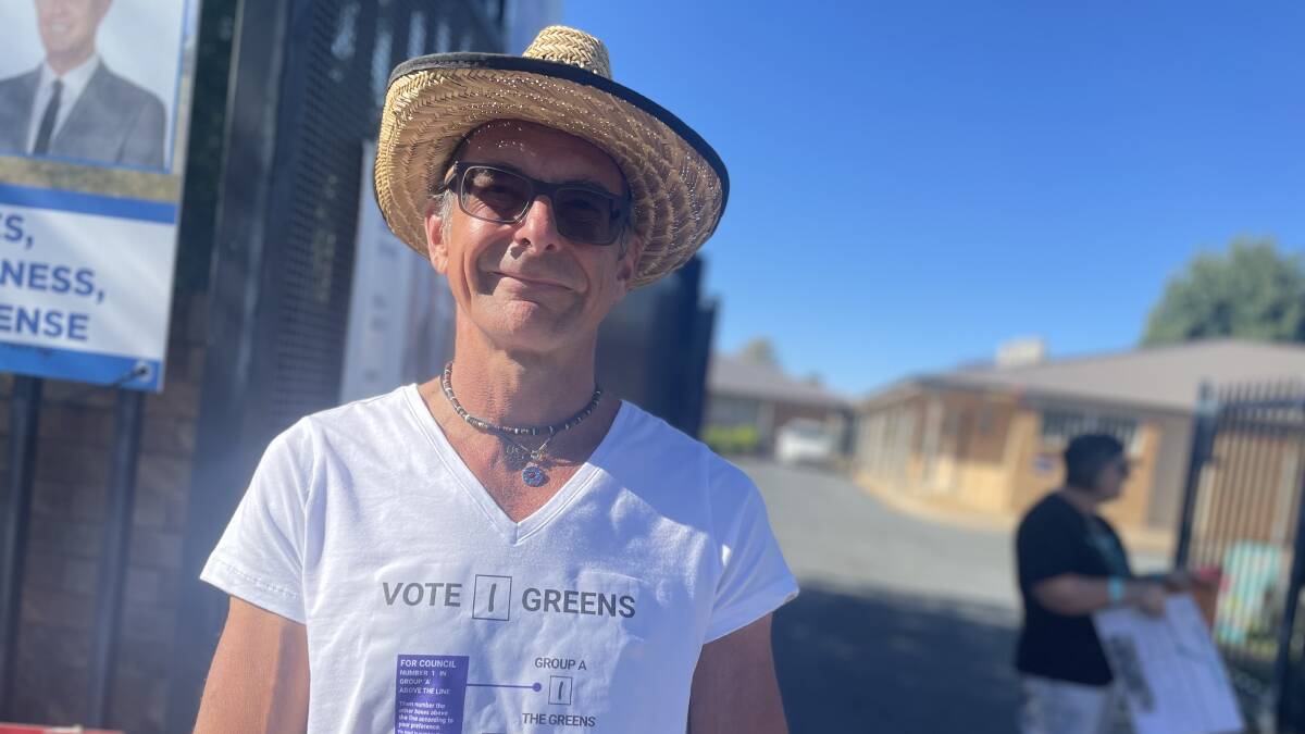 SOCIAL MOOD: Eric Kaiser said there was "a good vibe" at the Sturt Public School polling centre on Saturday. Picture: Monty Jacka