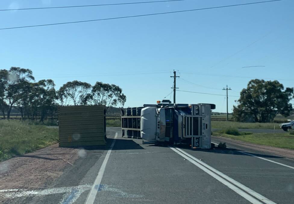 ACCIDENT: The truck's load came unattached as it was turning west onto Irrigation Way this morning. Picture: Contributed