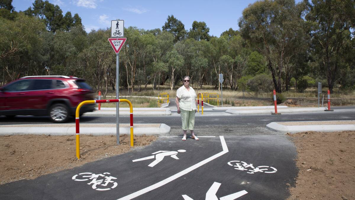 HAZARD: Gretchen Sleeman fears some vehicles travelling at the 70km/h speed limit on Red Hill Road will not have enough time to react to the new pedestrian island. Picture: Madeline Begley