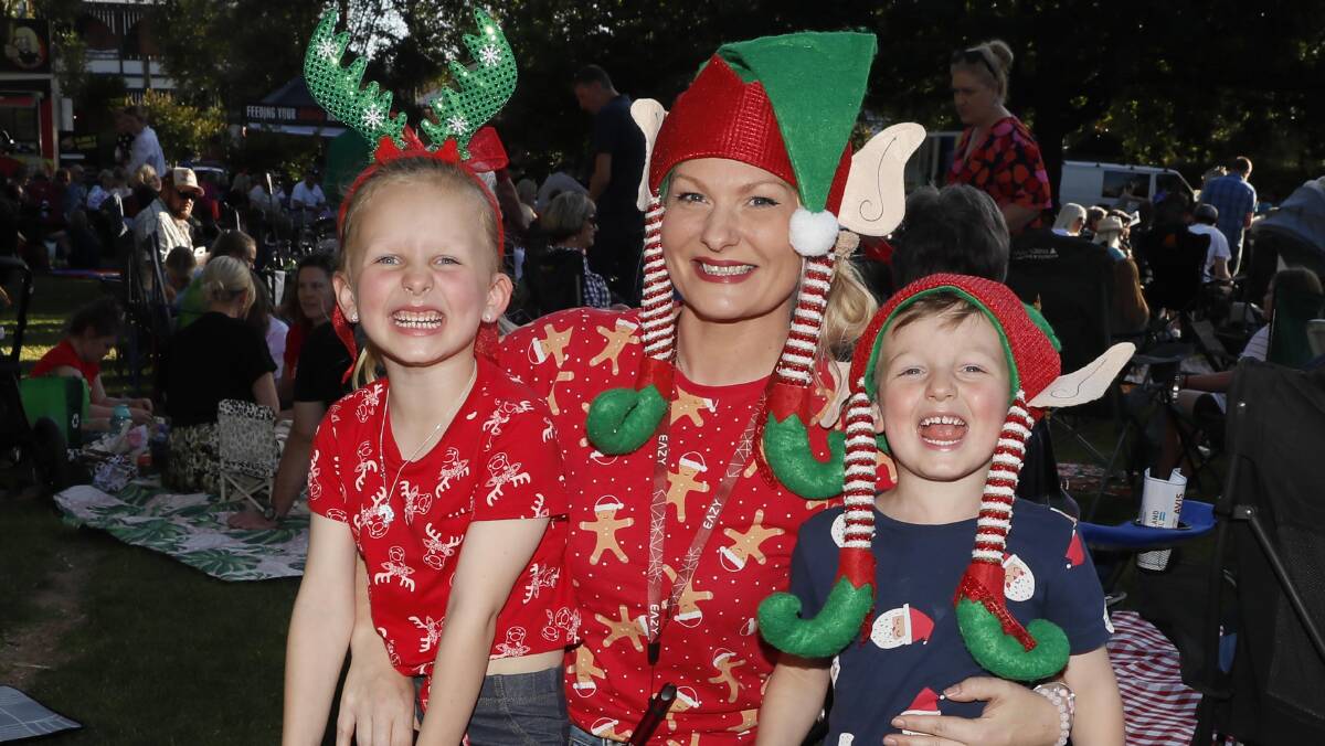 Hayley Allen-Freeman, Bella-Rose Breed, 6, and Jack Breed, 4, were decked out in festive cheer at the Christmas with the Con event. Picture by Les Smith