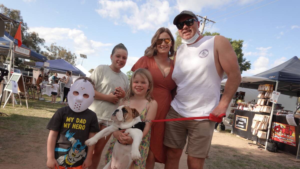 OUTING: Tate, Milla, Halle, Jen and Rick Campbell, alongside the slightly camera-shy Hatchy the dog, were among the hundreds of Wagga residents who attended the markets on Saturday. Picture: Monty Jacka