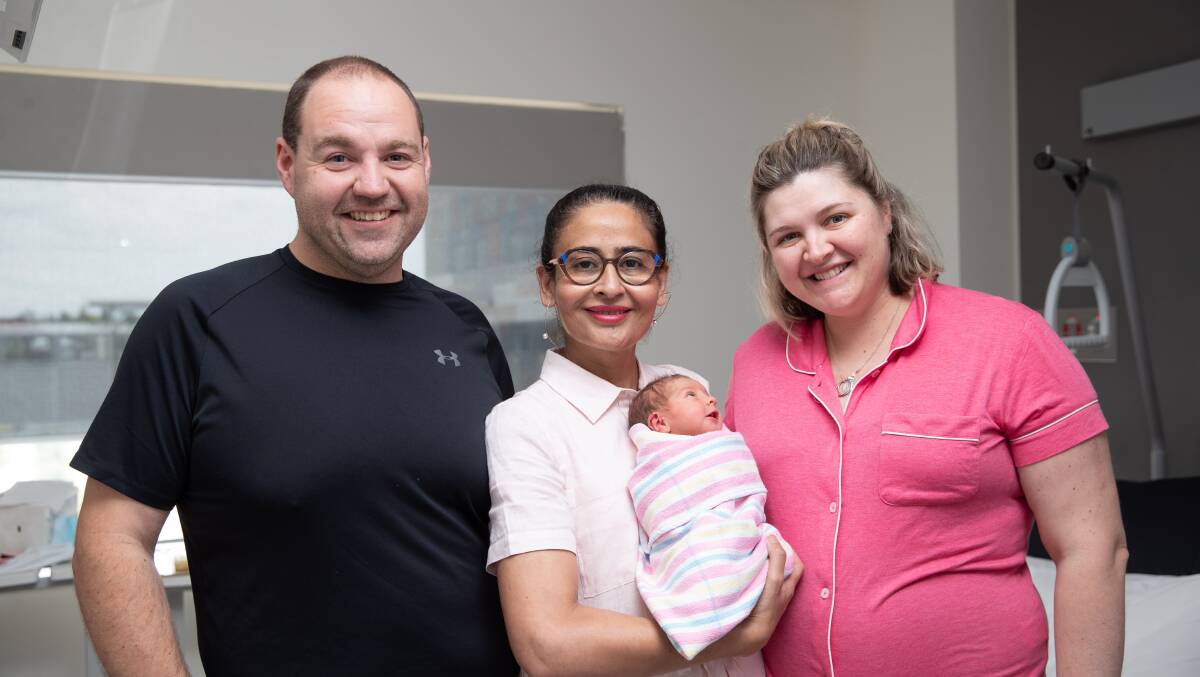 Timothy Ryan, Dr Rehana Lulania, Courtney Worland and young Callie Myra Ryan, the first baby to be born in Wagga this year. Picture by Madeline Begley
