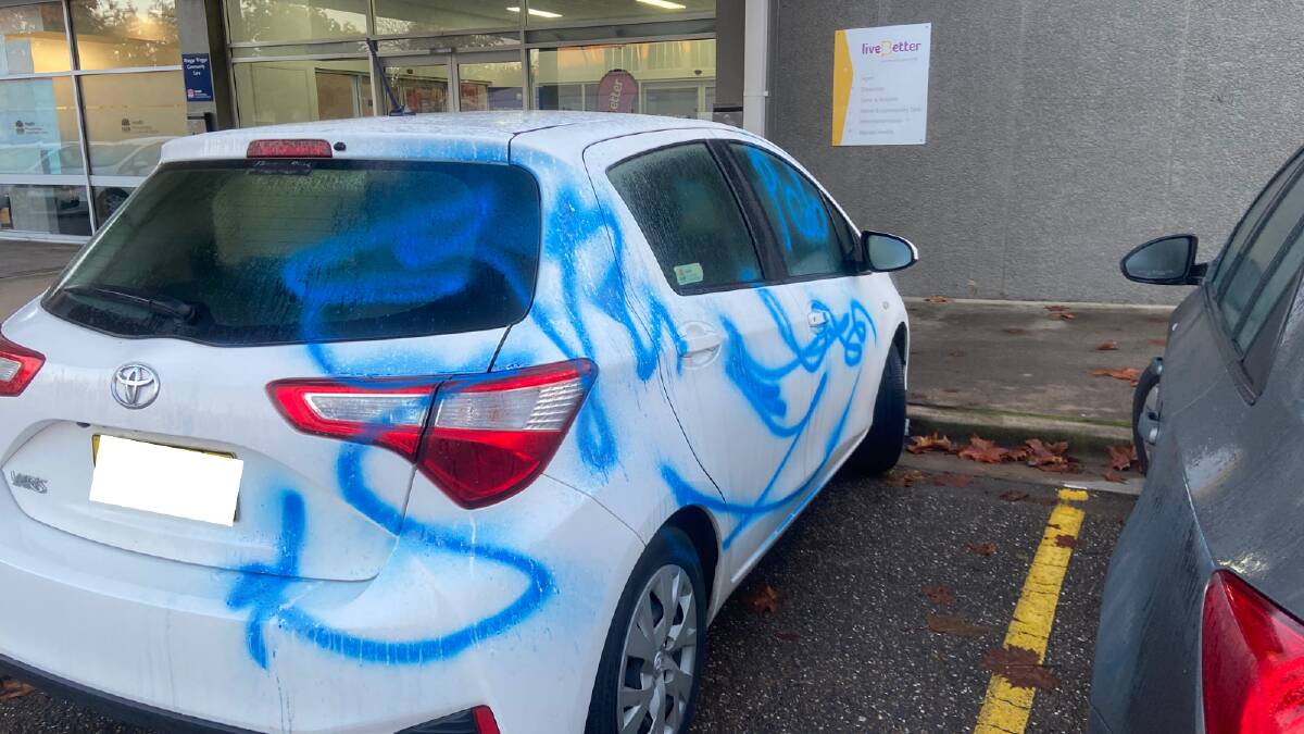 SPRAYED: Vandals spray painted profanities and symbols on up to six vehicles in the Peter Street carpark overnight. Picture: Daisy Huntly