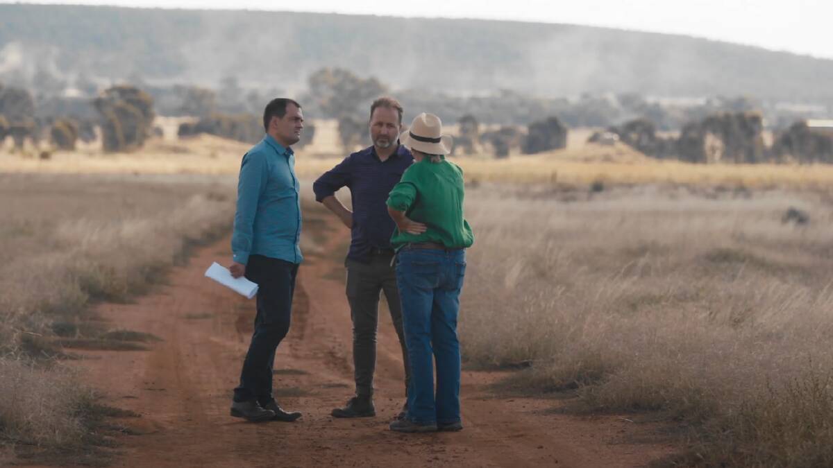 SUN DEAL: Grong Grong Solar Farm directors Gerald Arends and Jonathan Prendergast with landowner Gemma Purcell at the future site of the $4 million project. Picture: Grong Grong Solar Farm