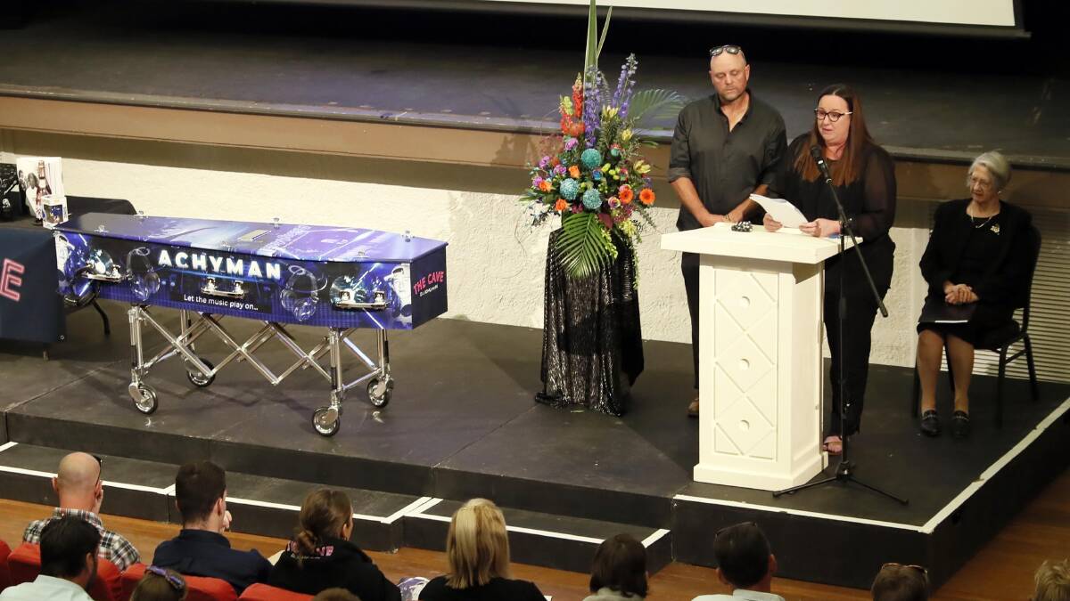Michael and Lisa Diggins were joined by hundreds of Junee residents at their son Zach's funeral in the Athenium Theatre yesterday. Pictures by Les Smith