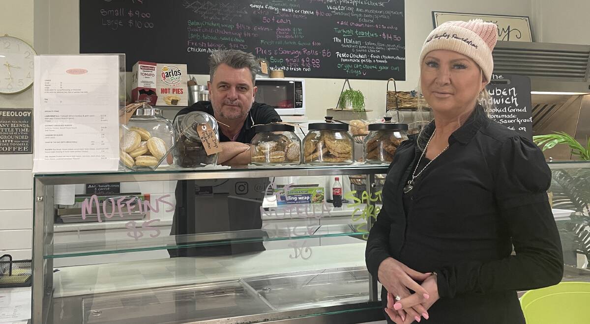 UNHAPPY: Le Brooks Cafe owners Glenn and Karen Pallister say the decision to increase the national minimum wage pushes extra costs onto already-struggling small businesses. Picture: Monty Jacka