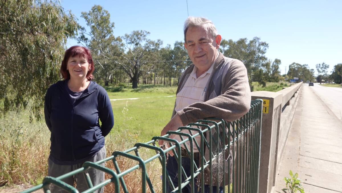 HISTORY: North Wagga Residents' Association president Robyn Dawson and member Peter Morris at the Parkan Pregan Bridge, one of the locations set to receive a heritage sign. Picture: Monty Jacka