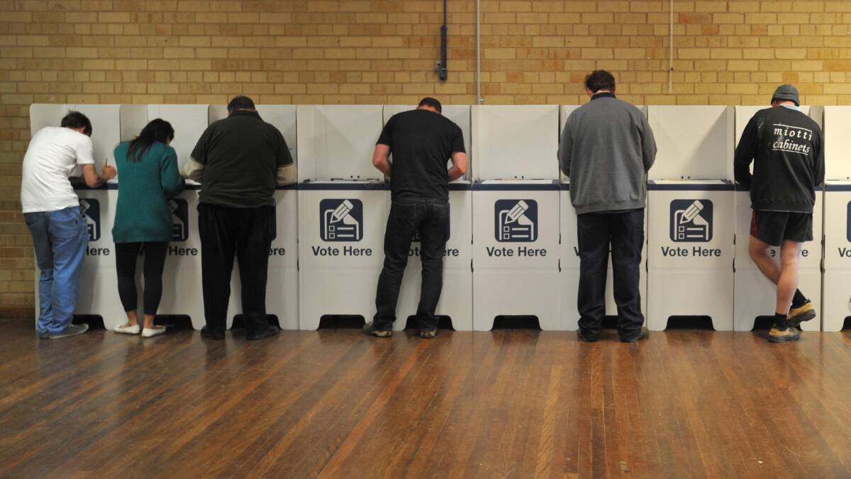 BALLOTS: Wagga residents casting their votes at Lake Albert Public during the 2012 council elections.