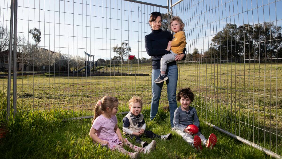 Louise Scobell with Eadie Durbridge, 4, Kobe Grentell, 2, William Scobell, 2, and Jack Scobell, 4, at the closed-off Galing Place park. Picture by Madeline Begley