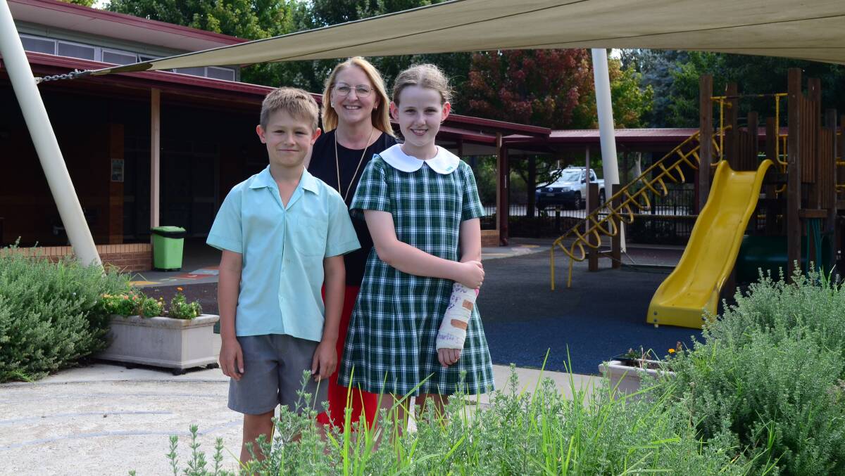 Lutheran School Wagga principal Janet Moeller, pictured with students Finnian MacLennan and Ruby Macauley, both 10, says she is 'very proud' of the school's NAPLAN results. Picture by Monty Jacka