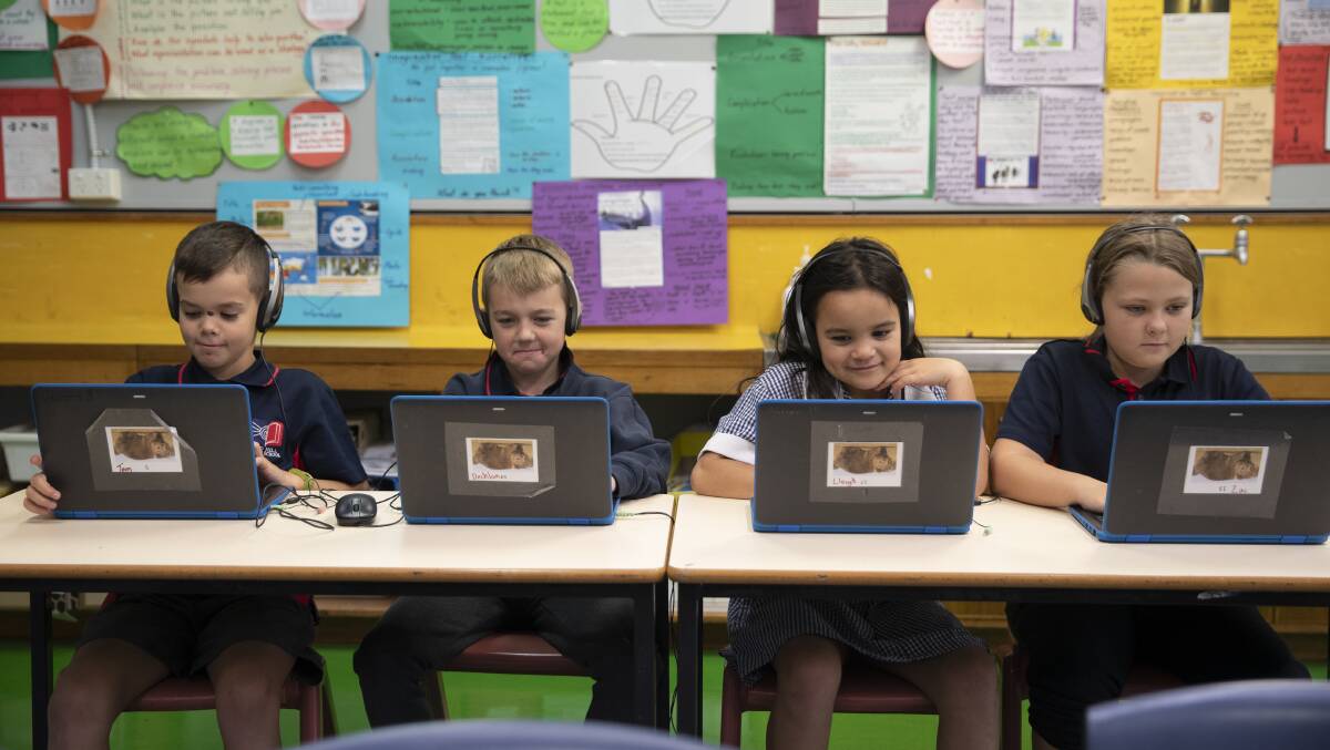 ONLINE TEST: Red Hill Public School students Bailey Rolls, Decklan Rutherford, Dana Ratu and Summah Moore preparing for their new-look NAPLAN test. Picture: Madeline Begley