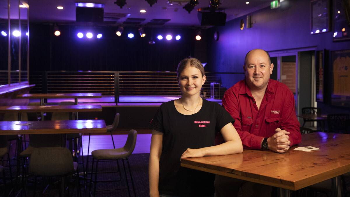 Duke of Kent bar manager Mikayla Kapel and licensee Ward Gaiter pictured with the venue's beloved stage in May, 2022. Picture by Madeline Begley