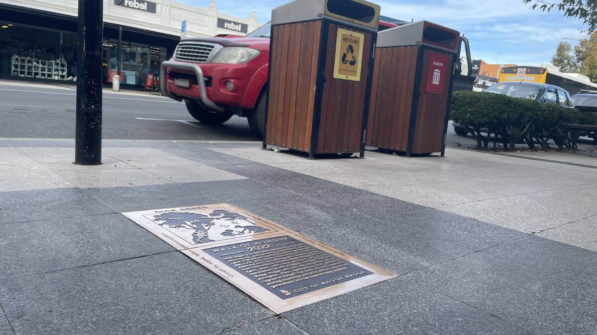 LEGACY: The plaque recognising Mr Green's contributions to the Wagga community has been installed just outside Intersport on Baylis Street. Picture: Monty Jacka 
