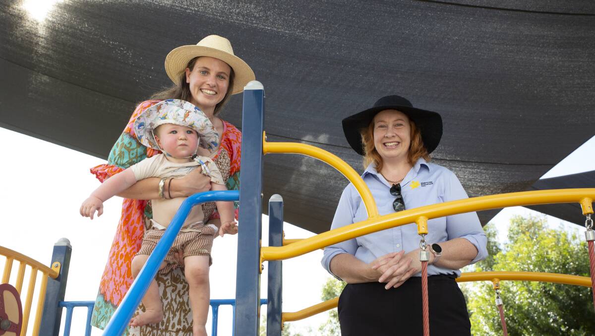 PROTECTION: Wagga councillor Georgie Davies with her son Lachie and Cancer Council NSW's Sheridan Evans at one of the city's few covered playgrounds. Picture: Madeline Begley