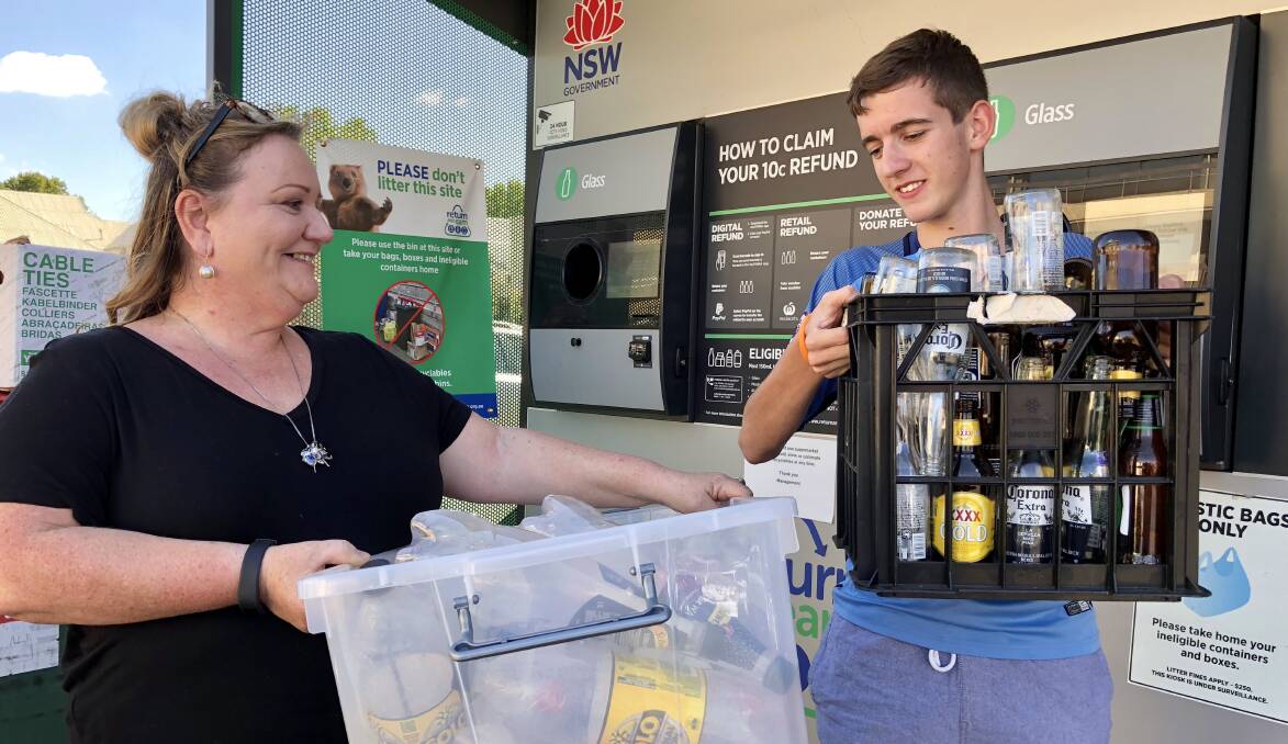 FUNDRAISER: Robyn Crouch has enlisted the help of her 16-year-old grandson Tynan Vidler in collecting bottles and cans from businesses across Wagga to help Cambodians in need.