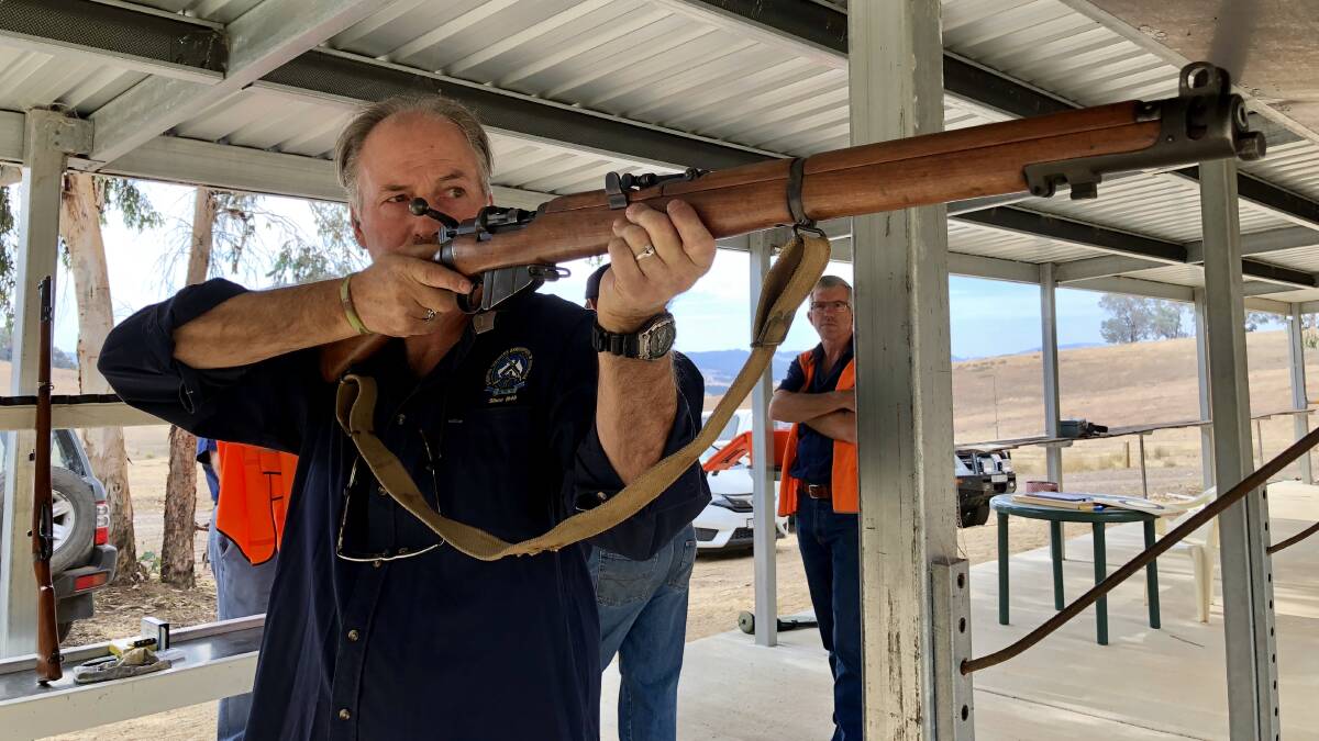 SHOOTER: Greg Hannon from the Wagga branch of the Sporting Shooters Association of Australia about to fire the Lee Enfield .303 rifle. Picture: Stephen Mudd