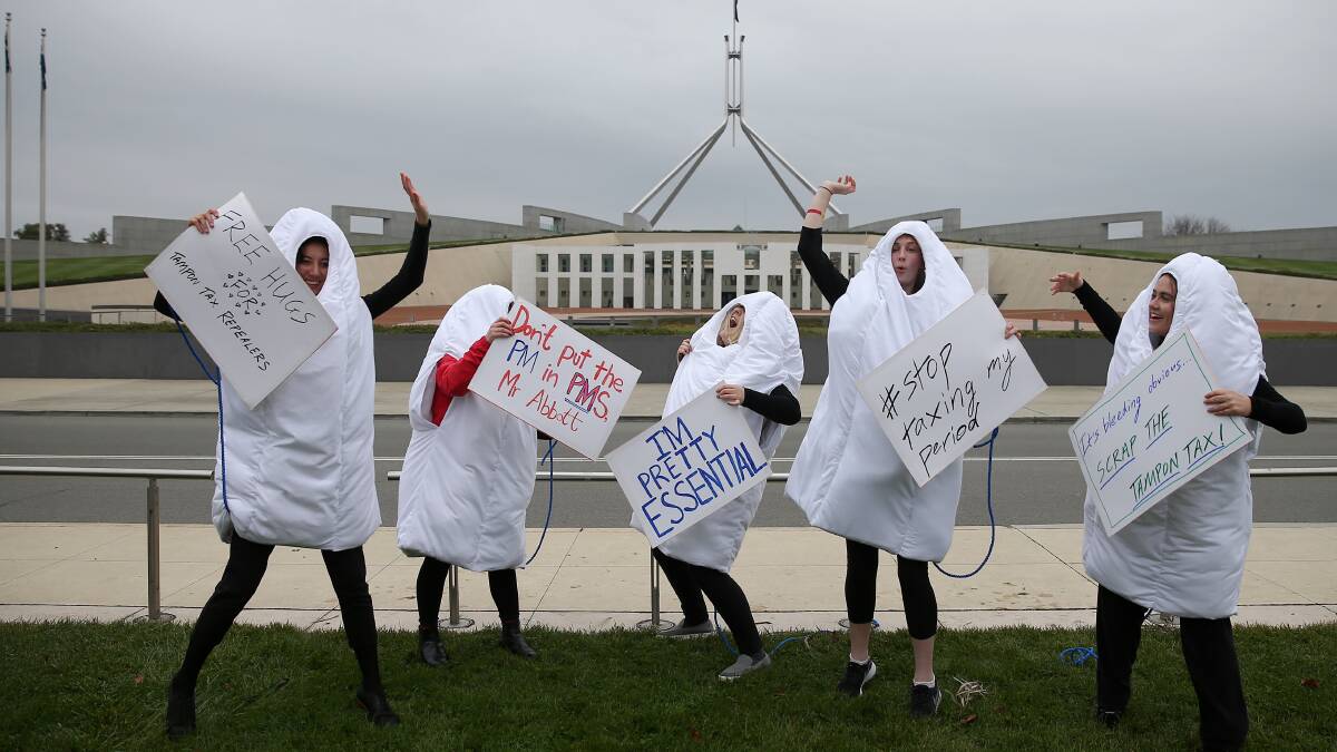Women protest the "tampon tax" at Parliament House in 2015.
