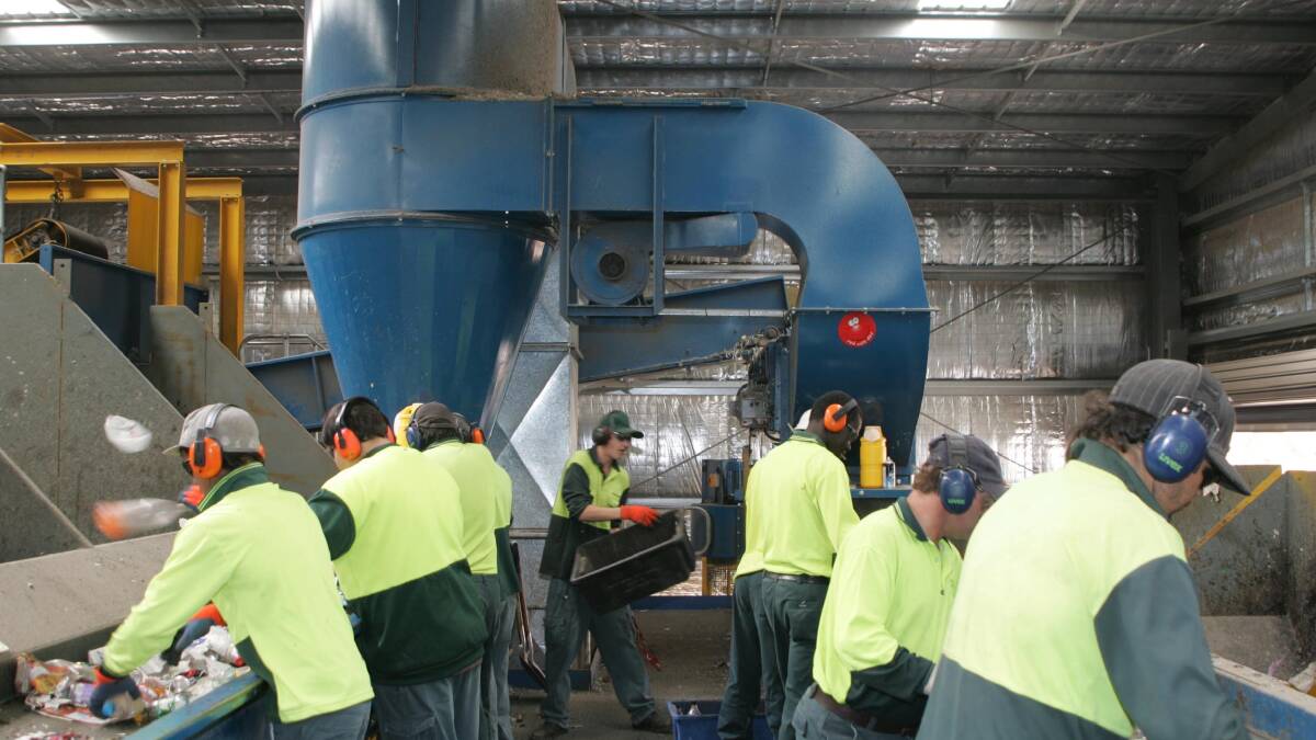 Workers at Kurrajong Recyclers in Wagga.