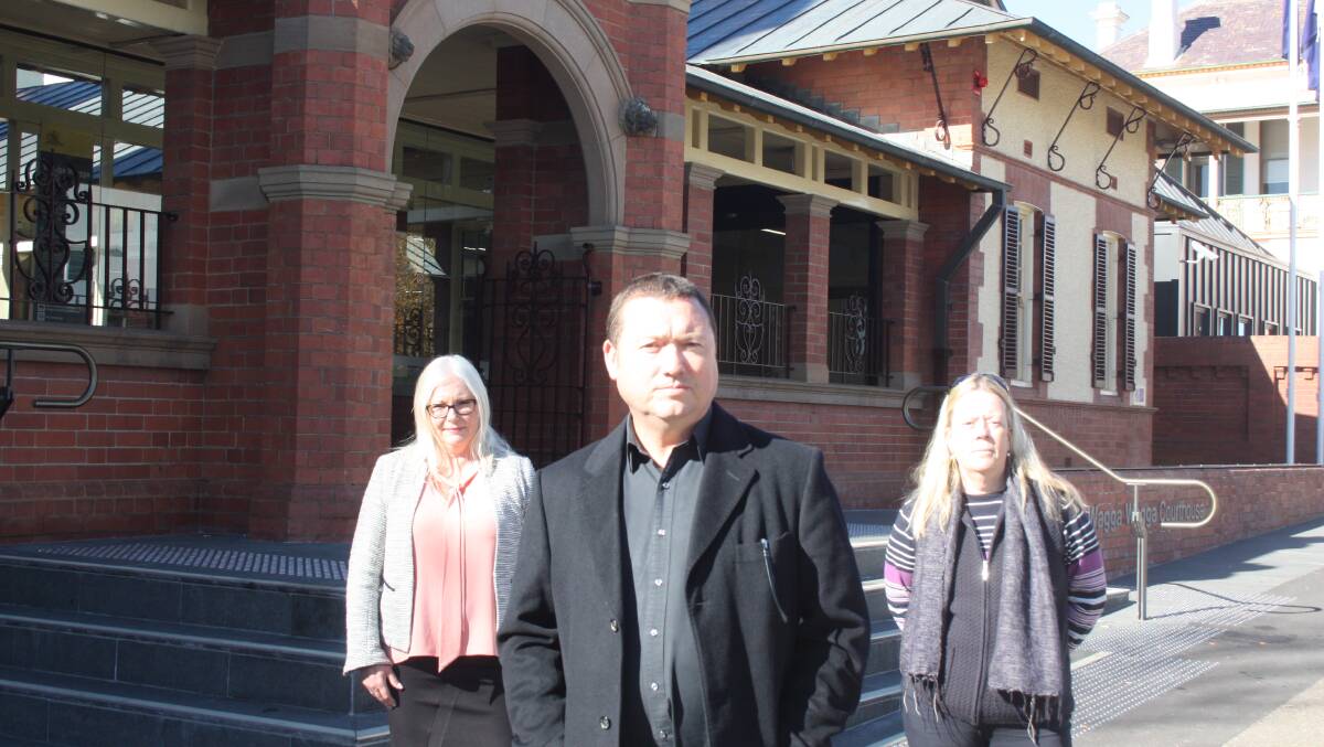 FIELDING COMPLAINTS: PSA manager of member services Kym Ward (left), general secretary Stewart Little and south west regional organiser Michelle Macintosh warm up outside the Wagga courthouse. Picture: Ken Grimson