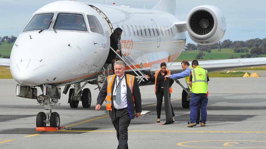 Paul Bredereck and one of the Jetgo passenger jets that will service the Wagga-Brisbane route.