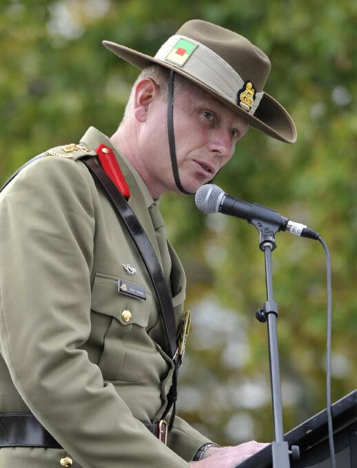 NATIONAL AWAKENING: Colonel Steve Jobson CSC delivers his Anzac Day address at Wagga's Victory Memorial Gardens. Picture: Les Smith
