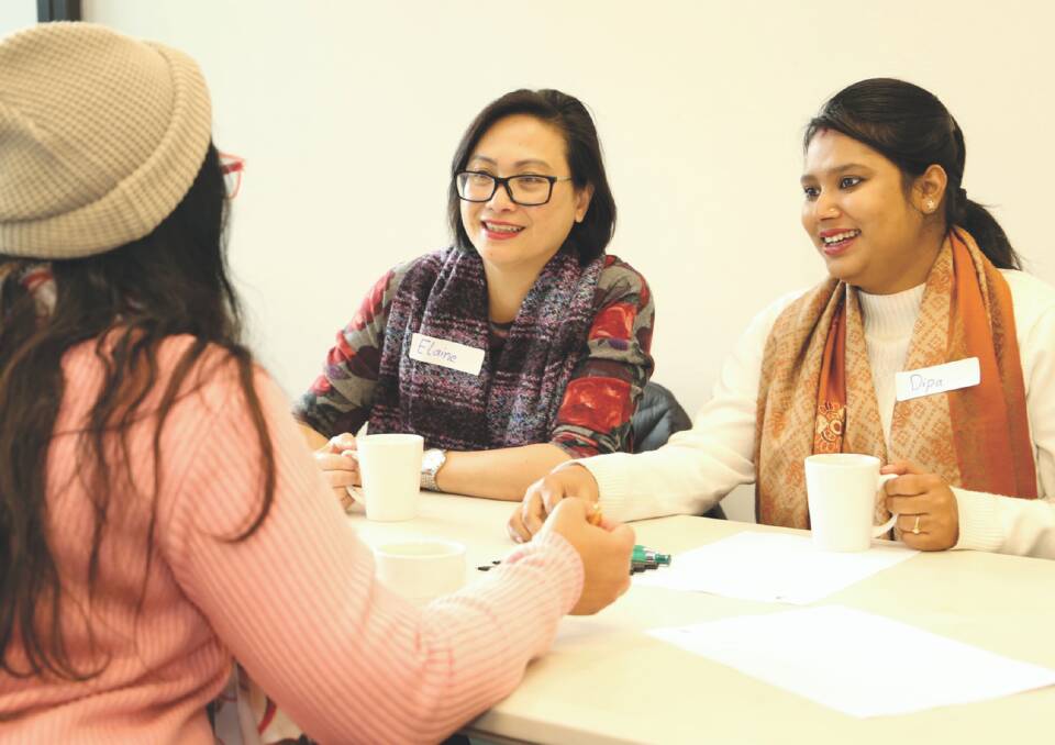 POPULAR: Elaine Cheung and Dipa Ghosh in Wagga Library's Language Cafe.