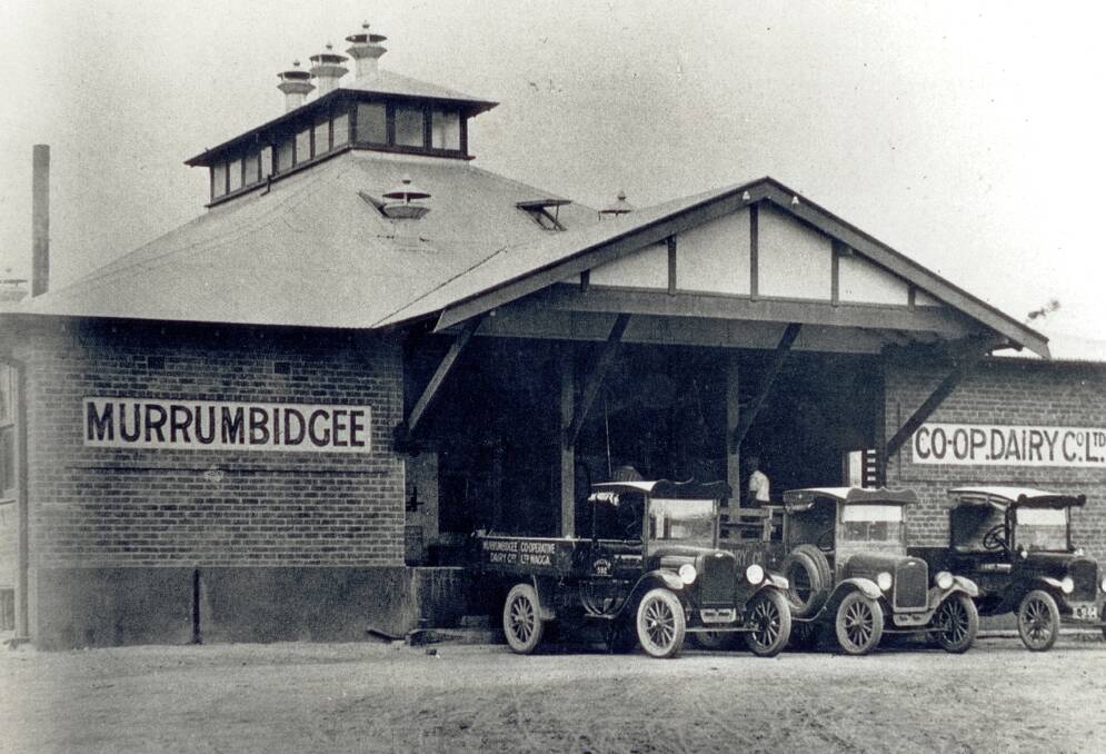 BACK THEN: Trucks lined up outside the Murrumbidgee Co-operative Dairy Company in the mid-1920s. Picture: SHERRY MORRIS COLLECTION