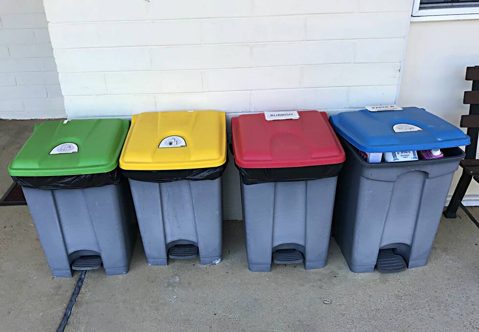 MAJOR WORRY: This well-intentioned, voluntary four-bin approach at a motel illustrates Australia's recycling problem.