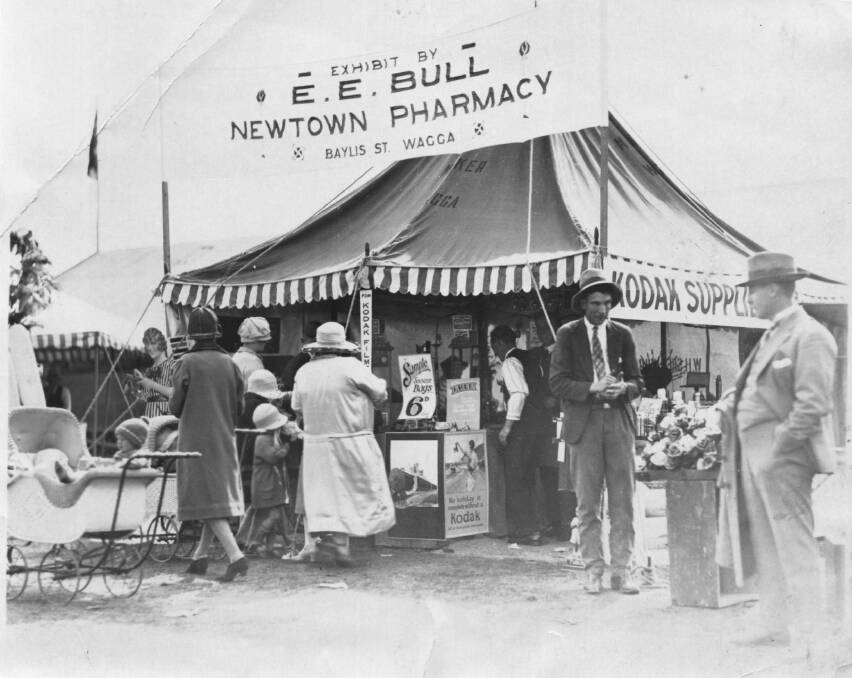 MOMENT IN TIME: EE Bull of Newtown Pharmacy, Baylis Street and his display at the Wagga Wagga Show in the 1920s. Picture: Supplied
