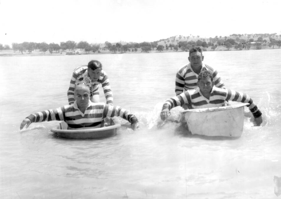 EVENT: Participants in a bathtub derby at Lake Albert. Photo is taken from the eastern side of the lake with Wagga Boat Club and Wagga Country Golf Club visible in the background. Picture: CSURA Lennon Collection RW1574.670