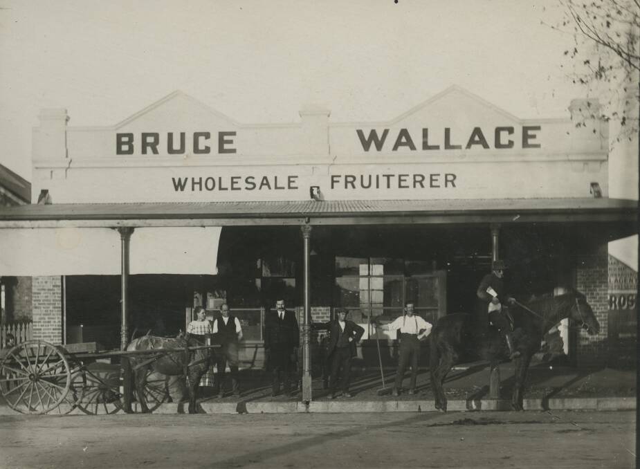 BACK THEN: Bruce Wallace, wholesale fruiterer, in Baylis Street. The store was established in 1917 and continued for several decades. Picture: CSURA RW5/383