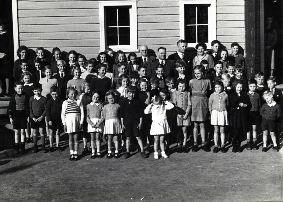 RETURN: Eddie Graham was a very popular State Member for Wagga from 1941 until his death in 1957. He was born and educated at Lake Albert and is pictured here on one of his return visits to Lake Albert Primary School. 