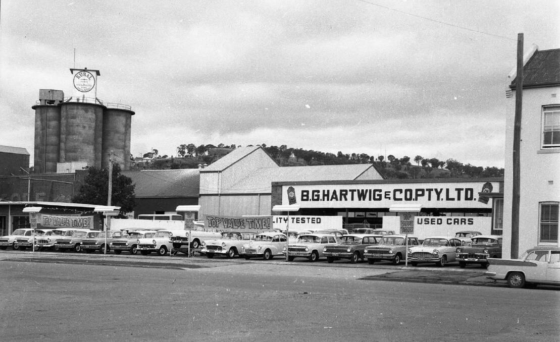 MOMENT IN TIME: Hartwigs used cars was located in Edward Street, between the Wagga Mill and the Red Lion Hotel. Picture: CSURA Lennon Collection RW1574.245