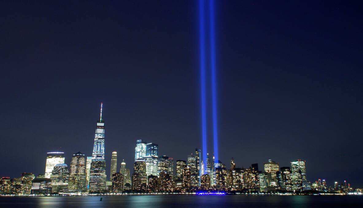 MEMORIAL: Two beams of light rise into the skies above New York, honouring the victims of 9/11. Picture: Kamil G. Polak/Shutterstock