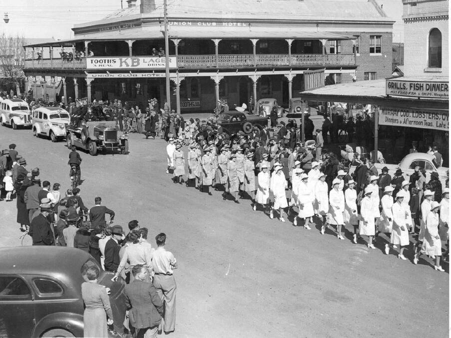 MOMENT IN TIME: A parade makes its way down Fitzmaurice Street sometime in the 1930s, passing the Union Club Hotel. Picture: Supplied