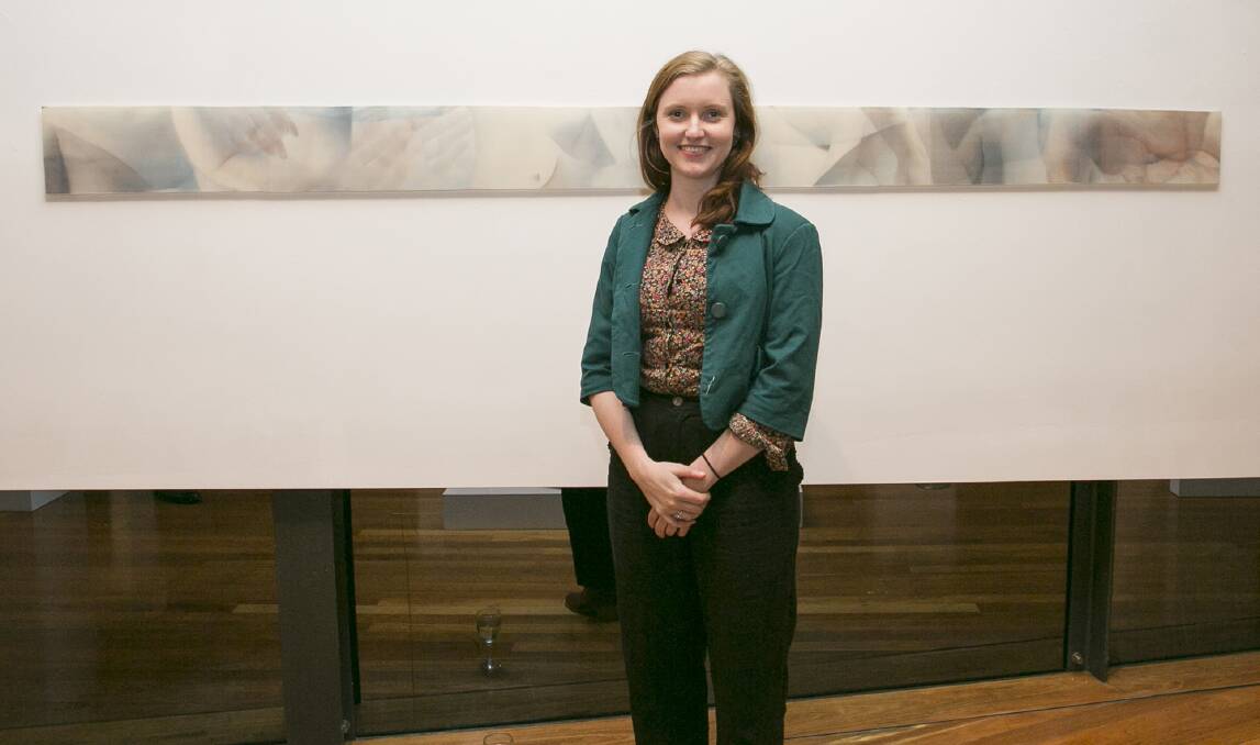 FASCINATING: National Emerging Art Glass Prize winner Rose-Mary Faulkner with work Continuum. Picture: SUPPLIED