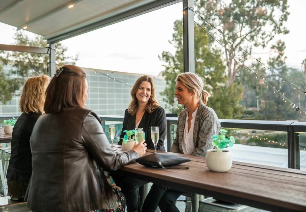 PLACE TO BE: Theatre patrons enjoy a pre-show drink on the balcony at Wagga Wagga Civic Theatre. Picture: Jack of Hearts Photography