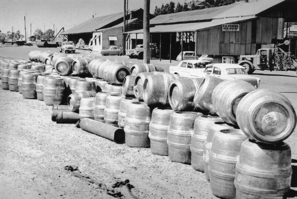 WAY WE WERE: Beer kegs awaiting transport at PE Power’s depot at Wagga Railway Station. Picture: Lennon Collection
