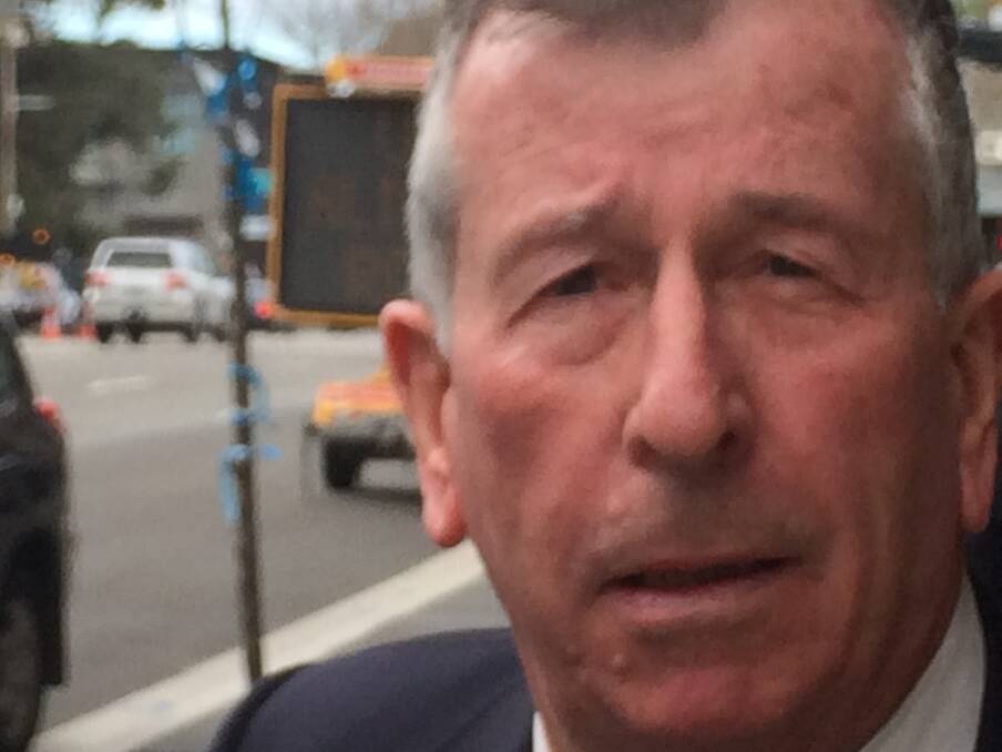 Trial: Former St Pius X College, Adamstown teacher Edward "Ted" Hall outside Newcastle Courthouse after he was charged with sexually abusing 11 former students.