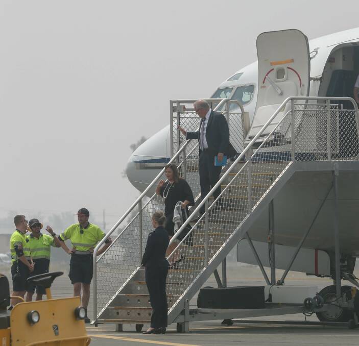 TOUCH DOWN: Prime Minister Scott Morrison and wife Jenny arrive at Albury Airport . Picture: TARA TREWHELLA