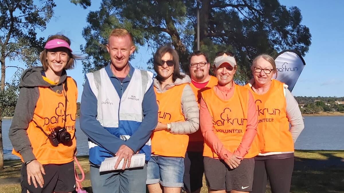 VOLUNTEERS: Wagga parkrun director Alex Walker (in blue) with the volunteers preparing for the second run of 2021. Picture: Contributed