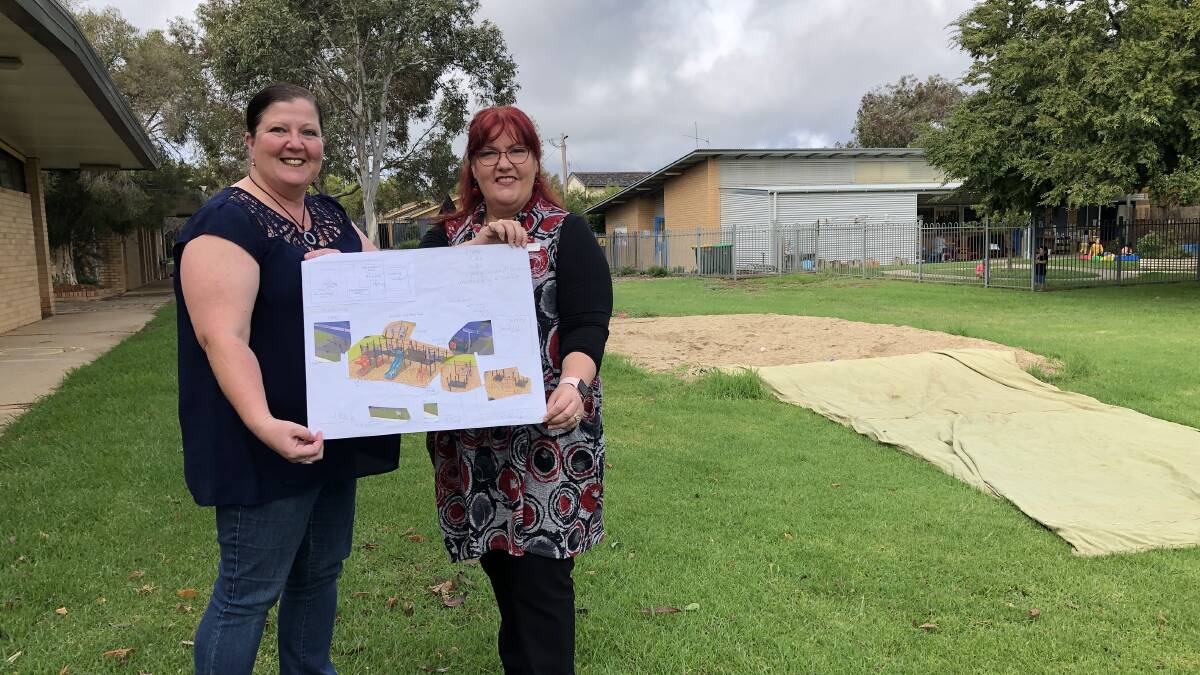 COMING TO FRUITION: Parent Jacinta Gordon and Red Hill Public School principal Tina Howorth at the site which will become the students' ideal playground. Picture: Rachel McDonald