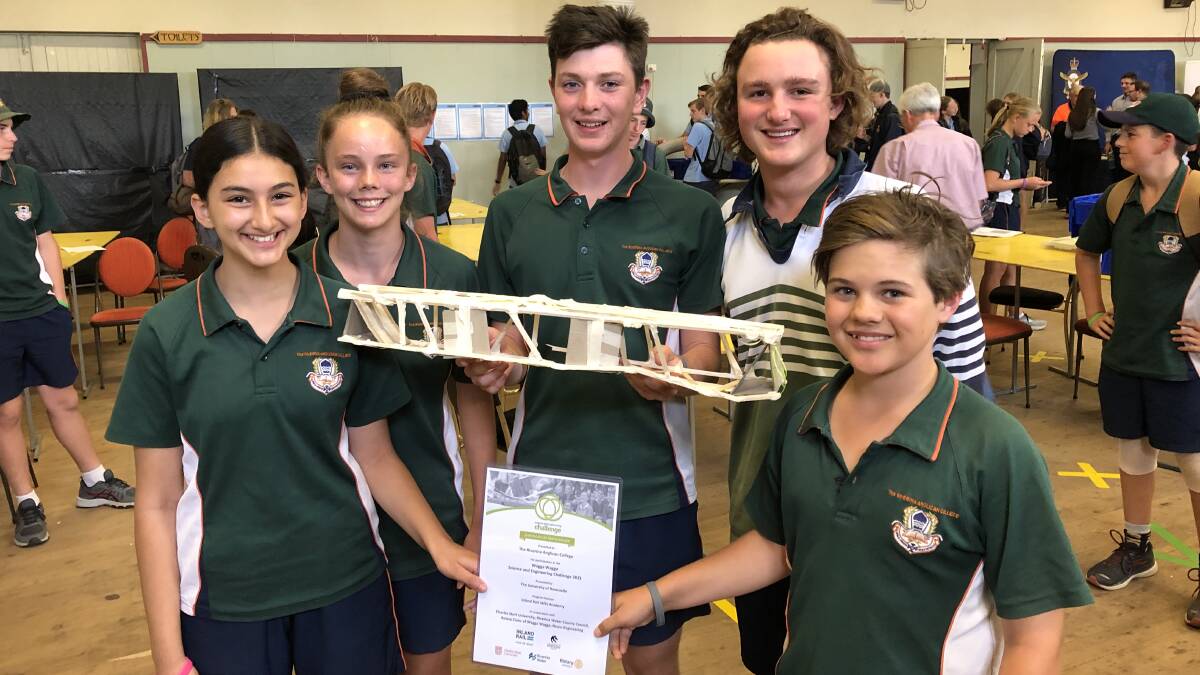 YOUNG ENGINEERS: Cecil Wahba, Leila Campbell, Andrew Woodgate, Josh Sarantakos and Jude Fuller with a bridge built by The Riverina Anglican College students. Picture: Rachel McDonald