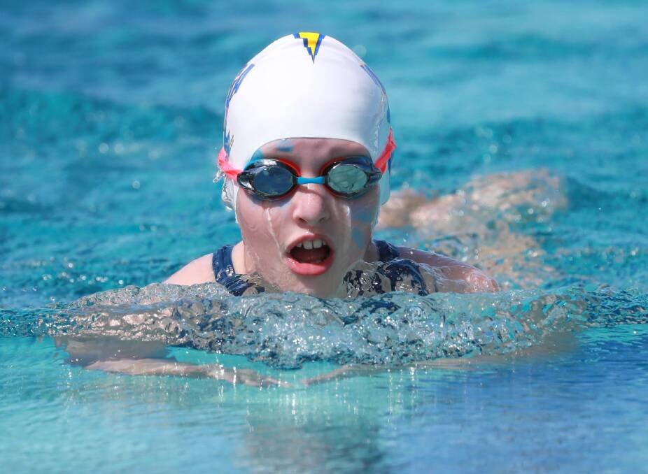 CHAMPION: 11 years girls champion Brynne Elliott, who won all but one of her races, swimming the 50 metre breaststroke at the Turvey Park carnival. Picture: Les Smith